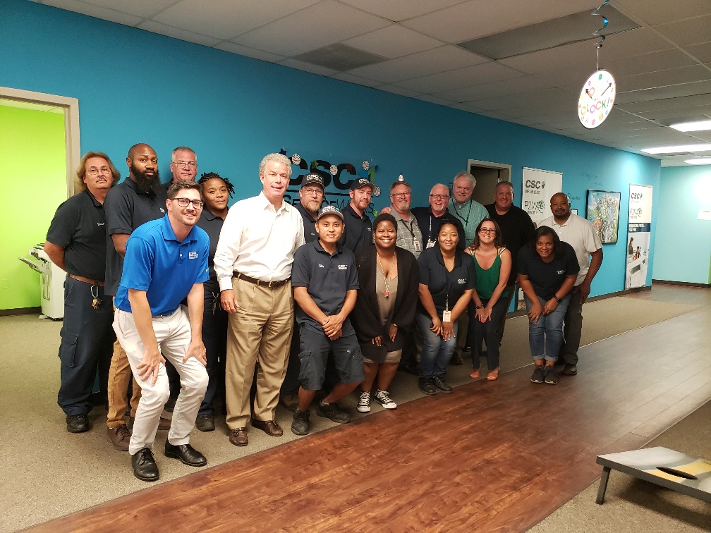 group of people celebrating at a retirement party